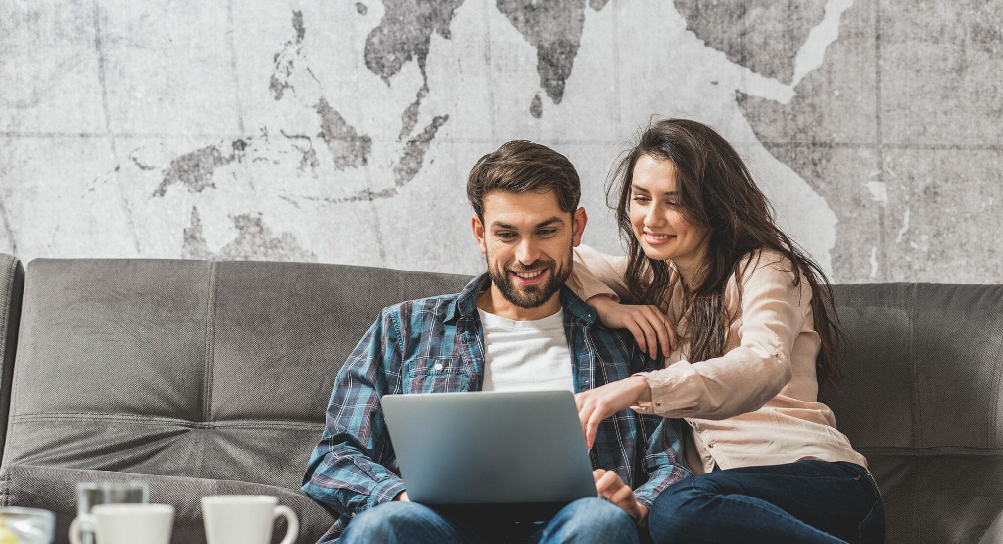 Other internet. Debt two people. Couple looking at Video on Computer.