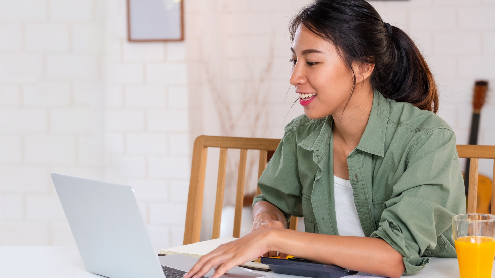 young woman looking at a computer