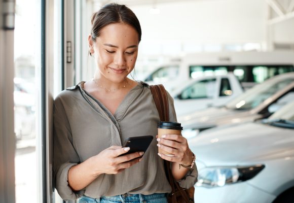 Shot of a young woman using her smartphone to send text messages