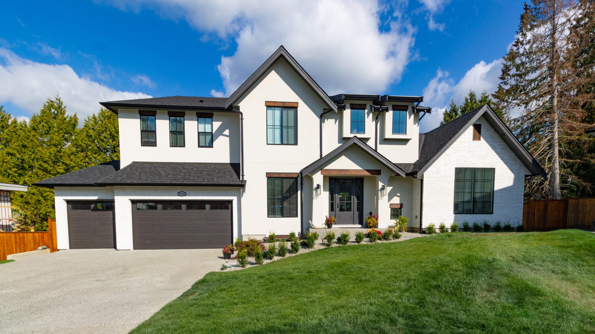 Wide Angle Shot of a Big white beautiful house in the suburbs