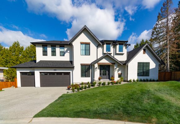 Wide Angle Shot of a Big white beautiful house in the suburbs
