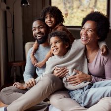 Happy black family enjoying in their time at home.