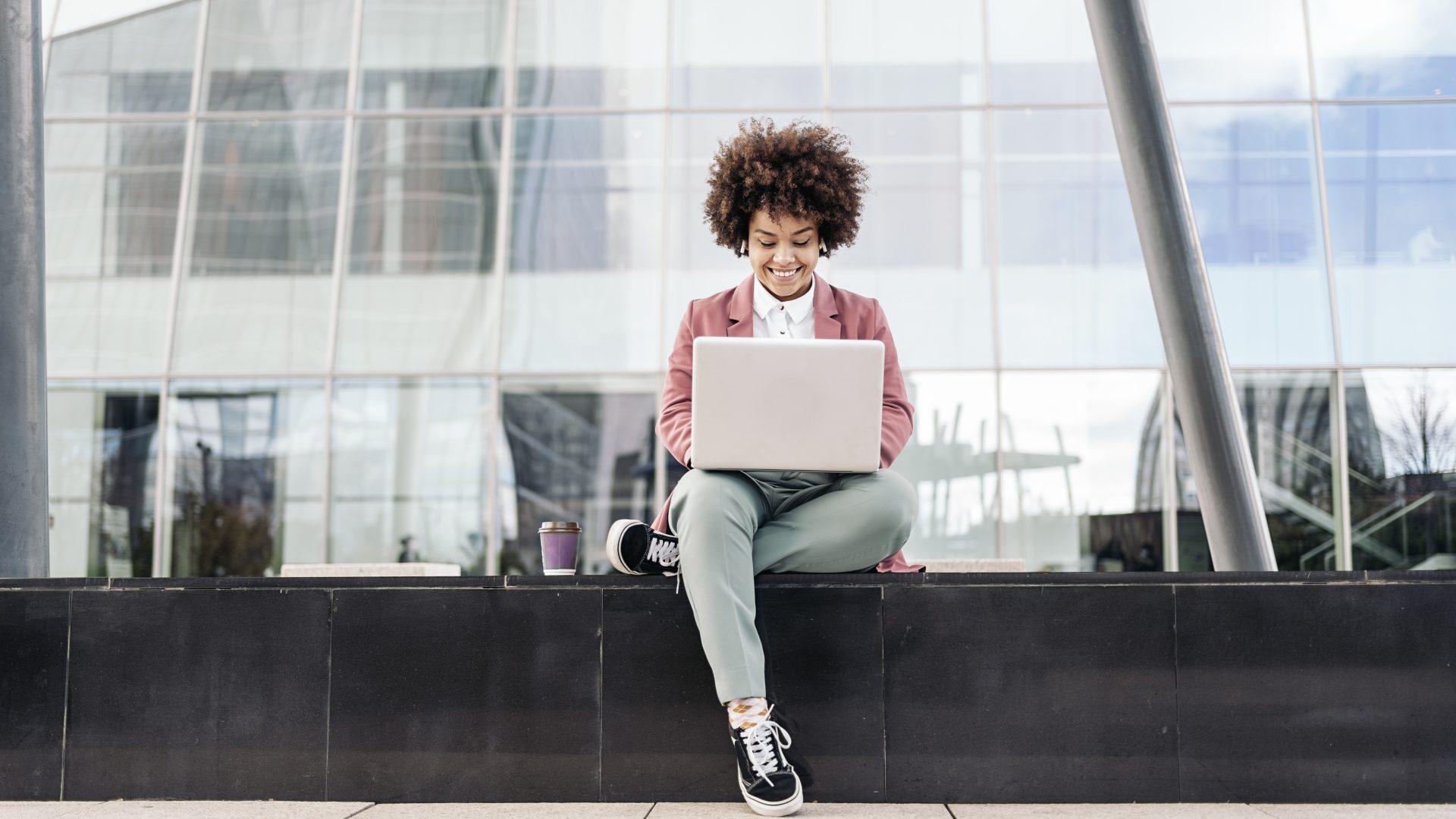 Business Woman Using Laptop Outdoors