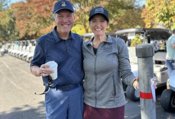 man and woman smiling