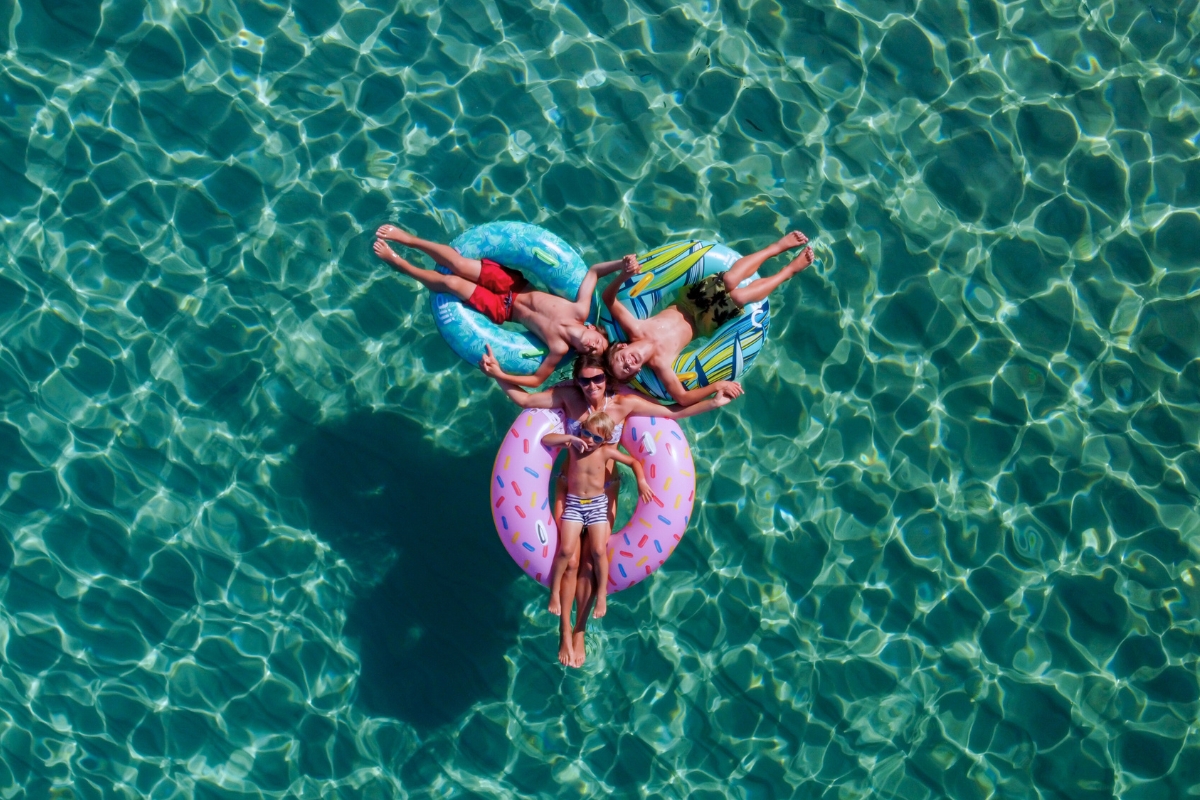 people floating in pool