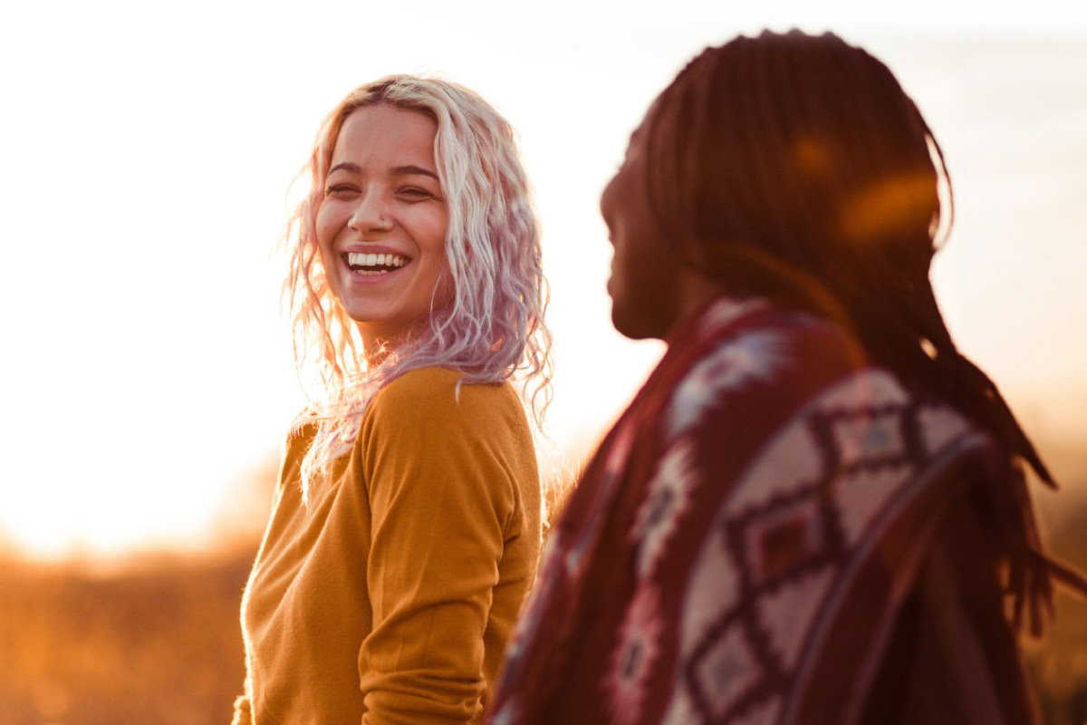 two women smiling at each